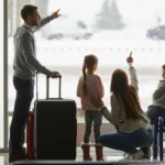 Autumn Budget 2024 - young family watching planes at airport